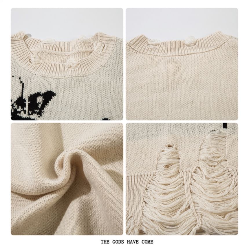 Derbundy - Oversized trui met ronde hals en vlinderprint