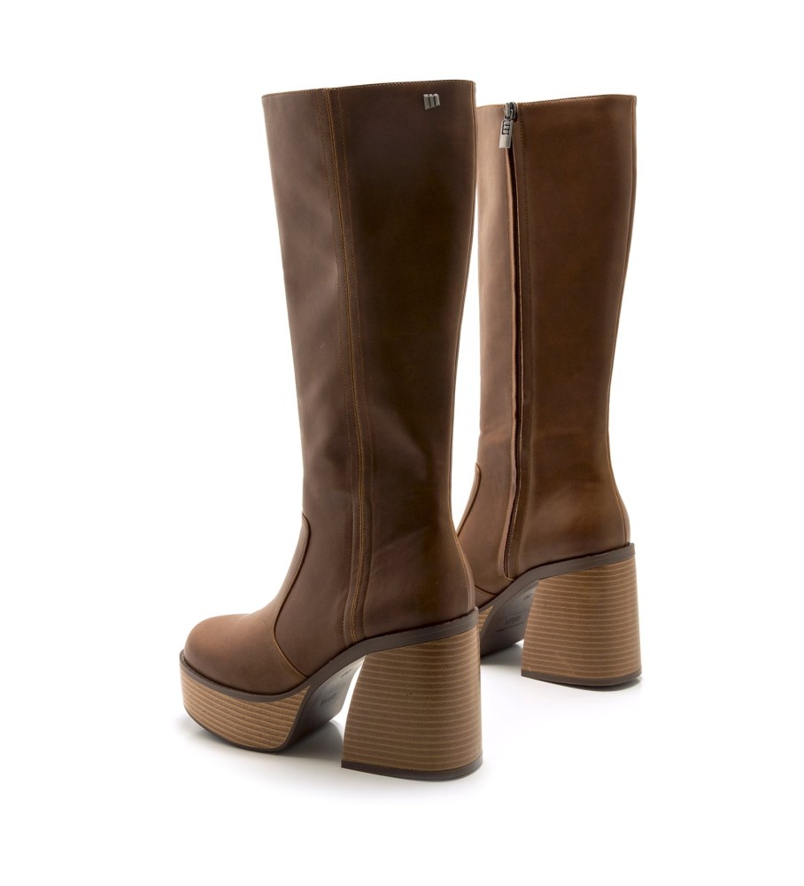 Botas Mustang de couro marrom dos anos setenta