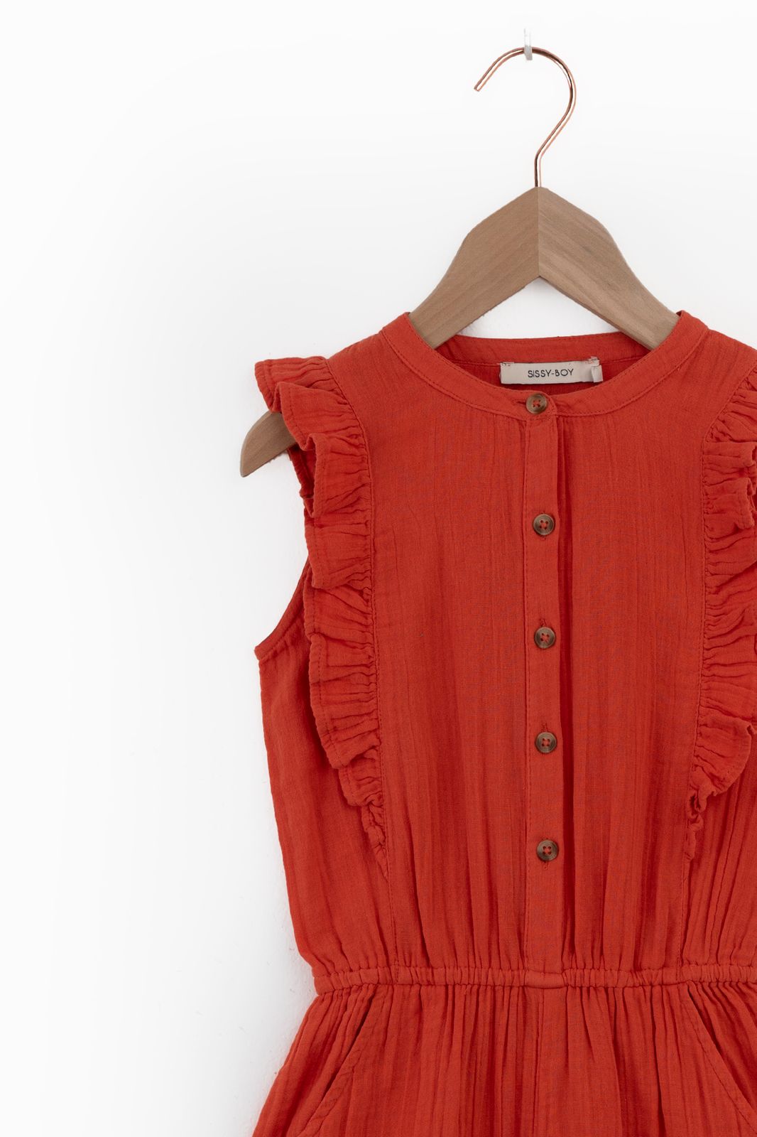 Rood mousseline jumpsuit met ruffle details