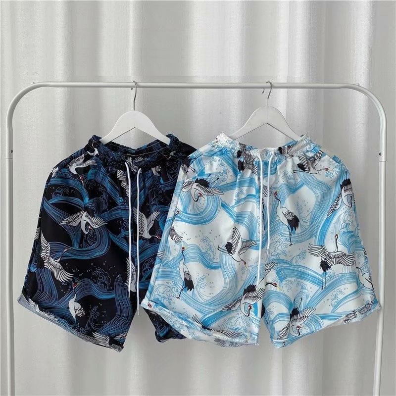 Acrius - Shorts met trekkoord in de taille en tropische print