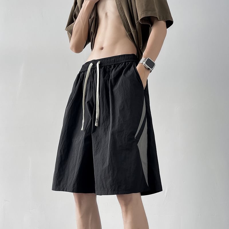 Hushgrain - Tweekleurige shorts met wijde pijpen en trekkoord in de taille