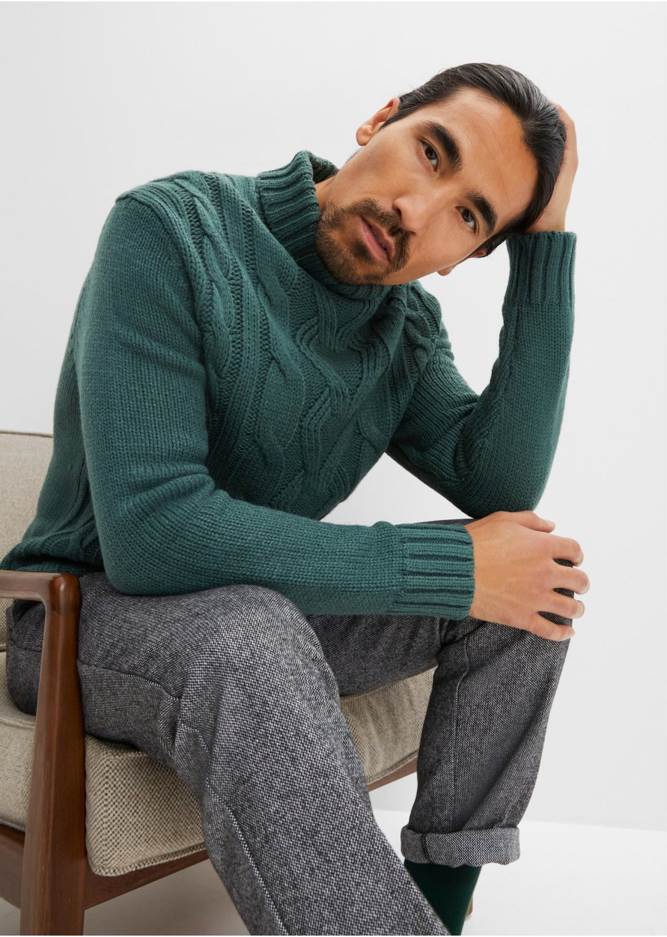 Pull col roulé à motif torsadé