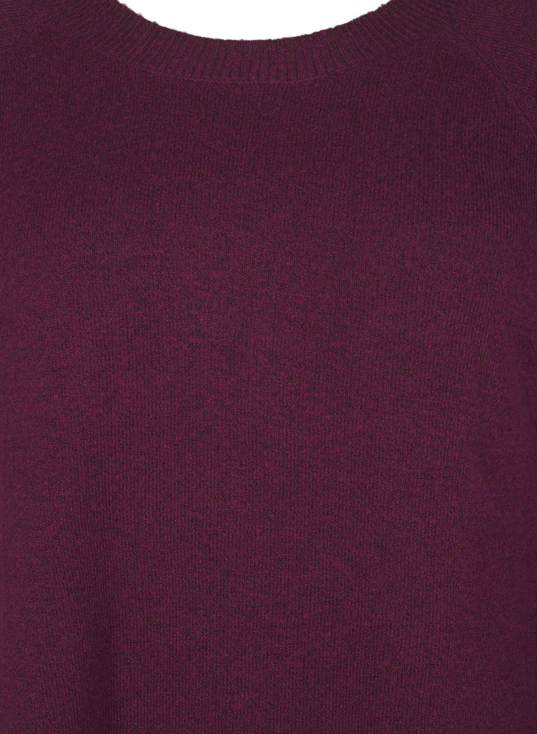Strikbluse med perledetaljer