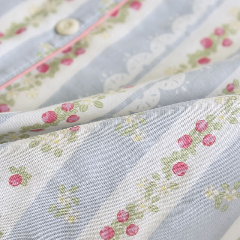 Somnus - Pyjamaset: Top met lange mouwen, reverskraag, bloemenprint en knoopjes + broek
