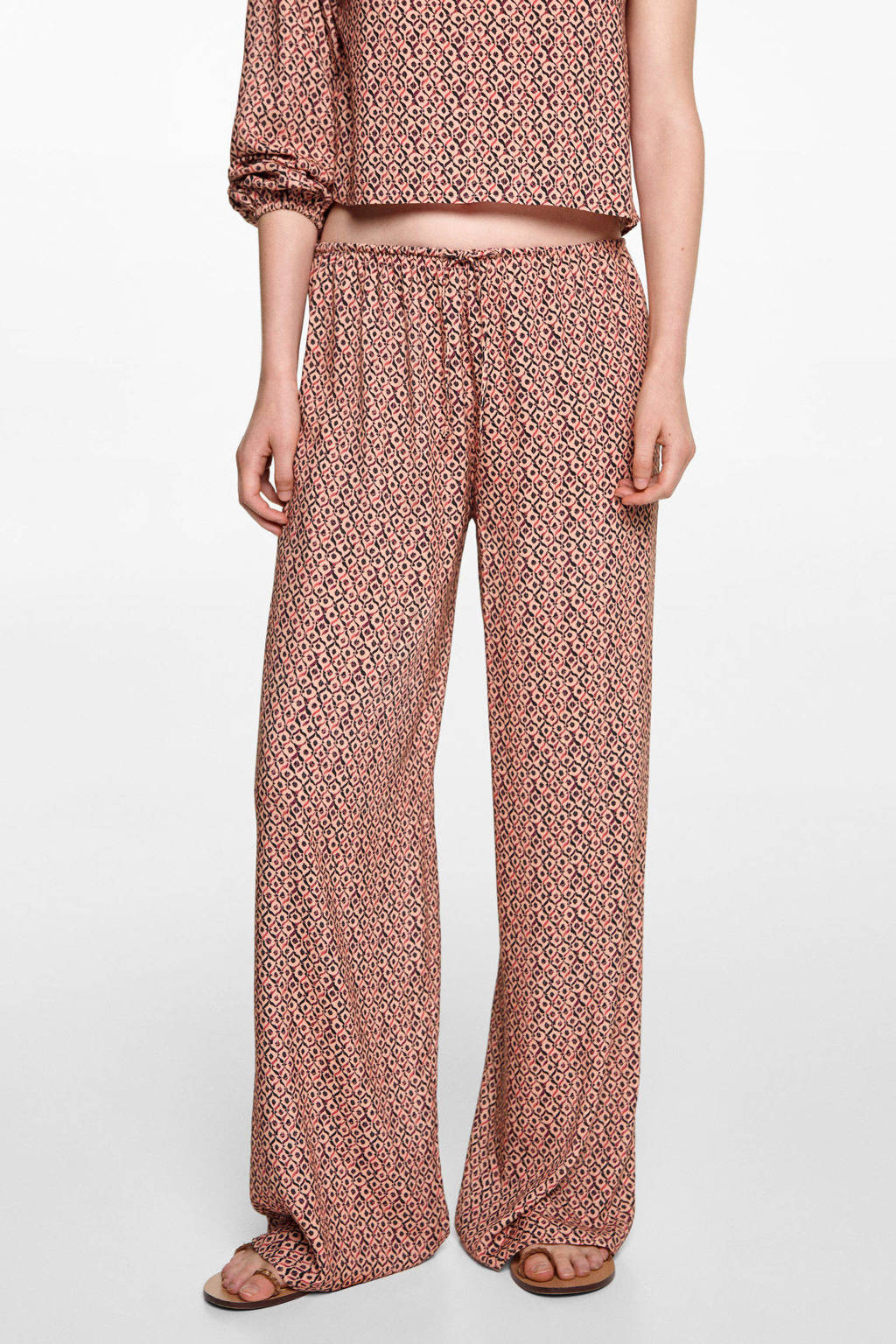 MANGO TEEN broek met all over print lichtoranje/zwart