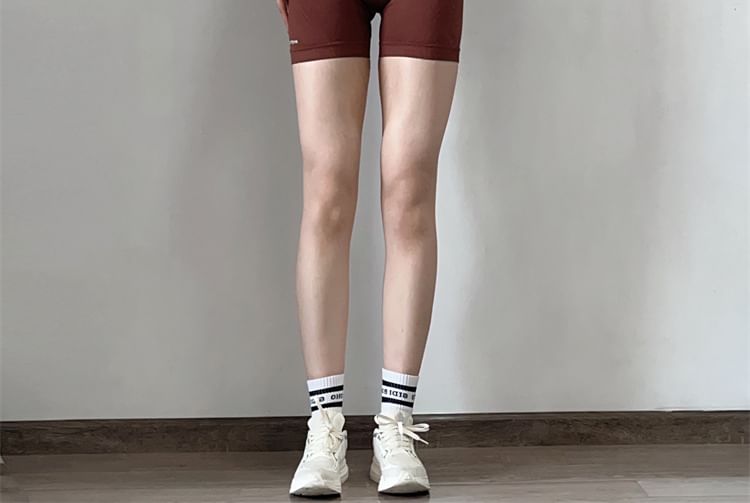 Arigne - Yogashorts met hoge taille en letters