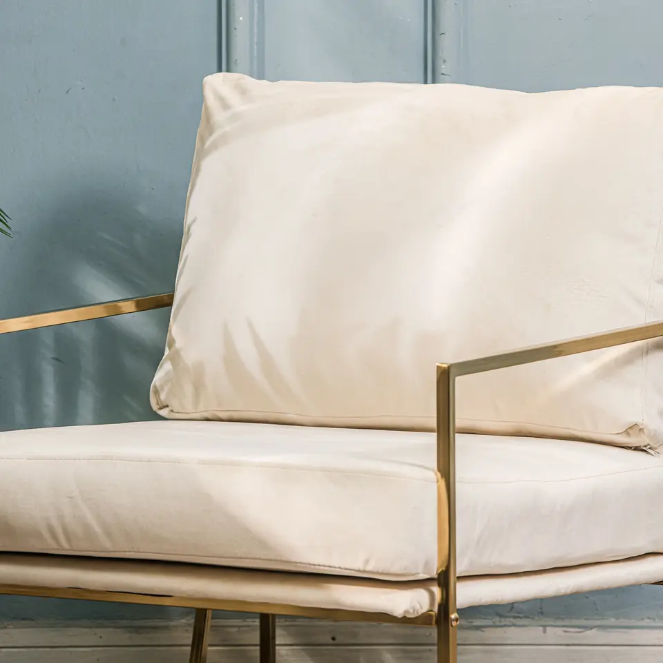Retro metalen fauteuil met beige fluweel