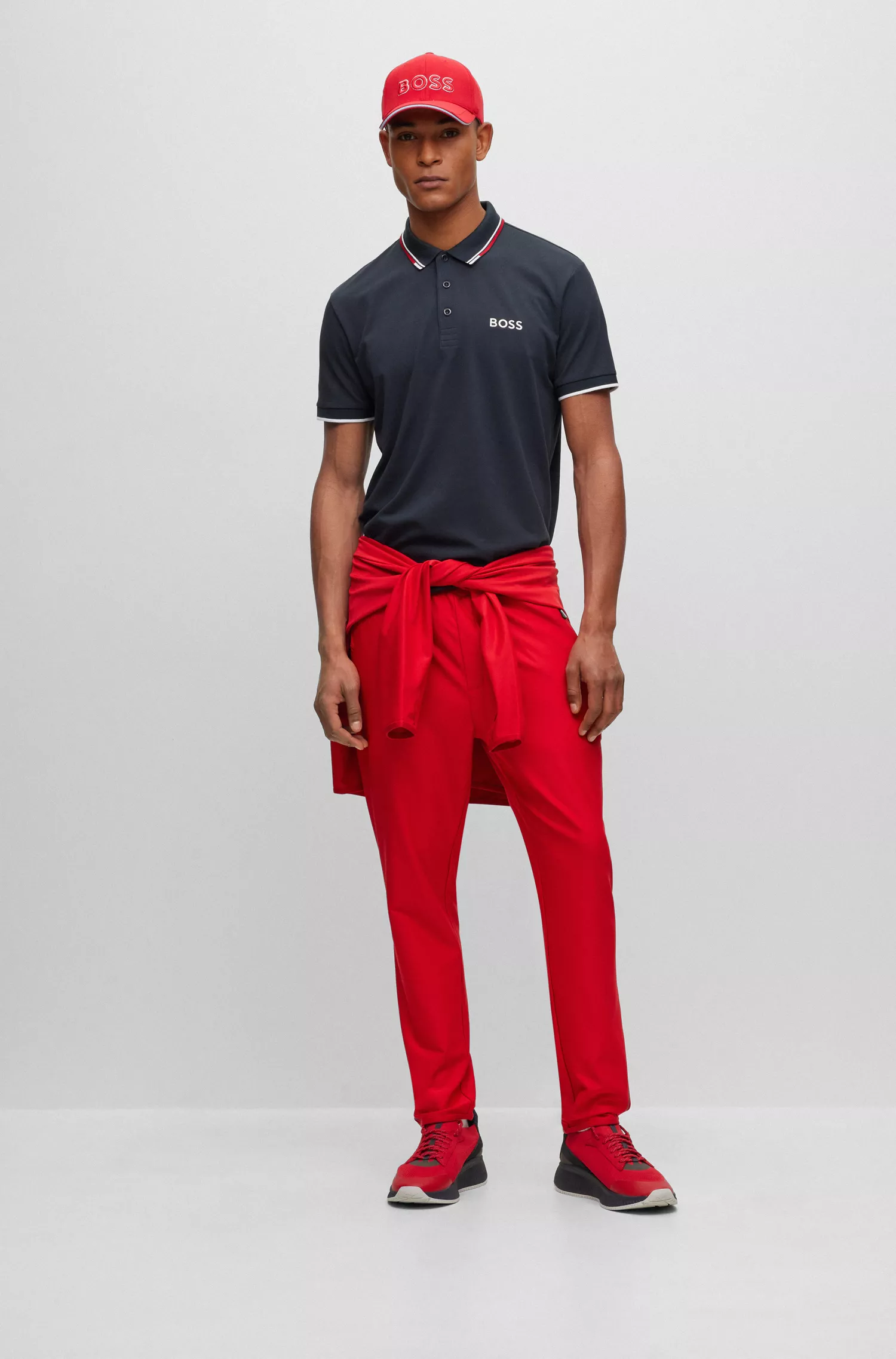 Camisa polo BOSS verde em mistura de algodão com detalhes contrastantes.