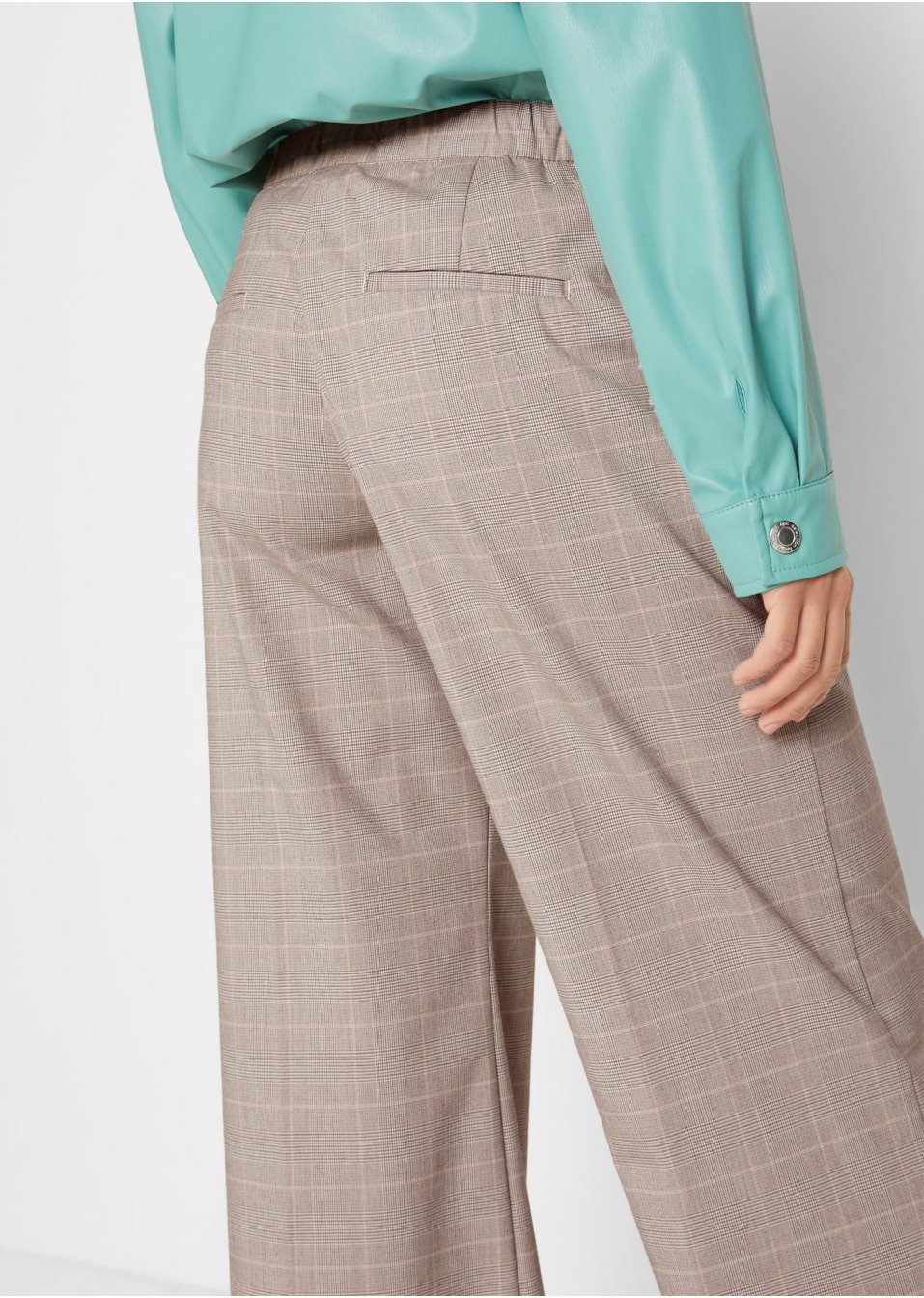 Pantalon à carreaux avec sangle décorative