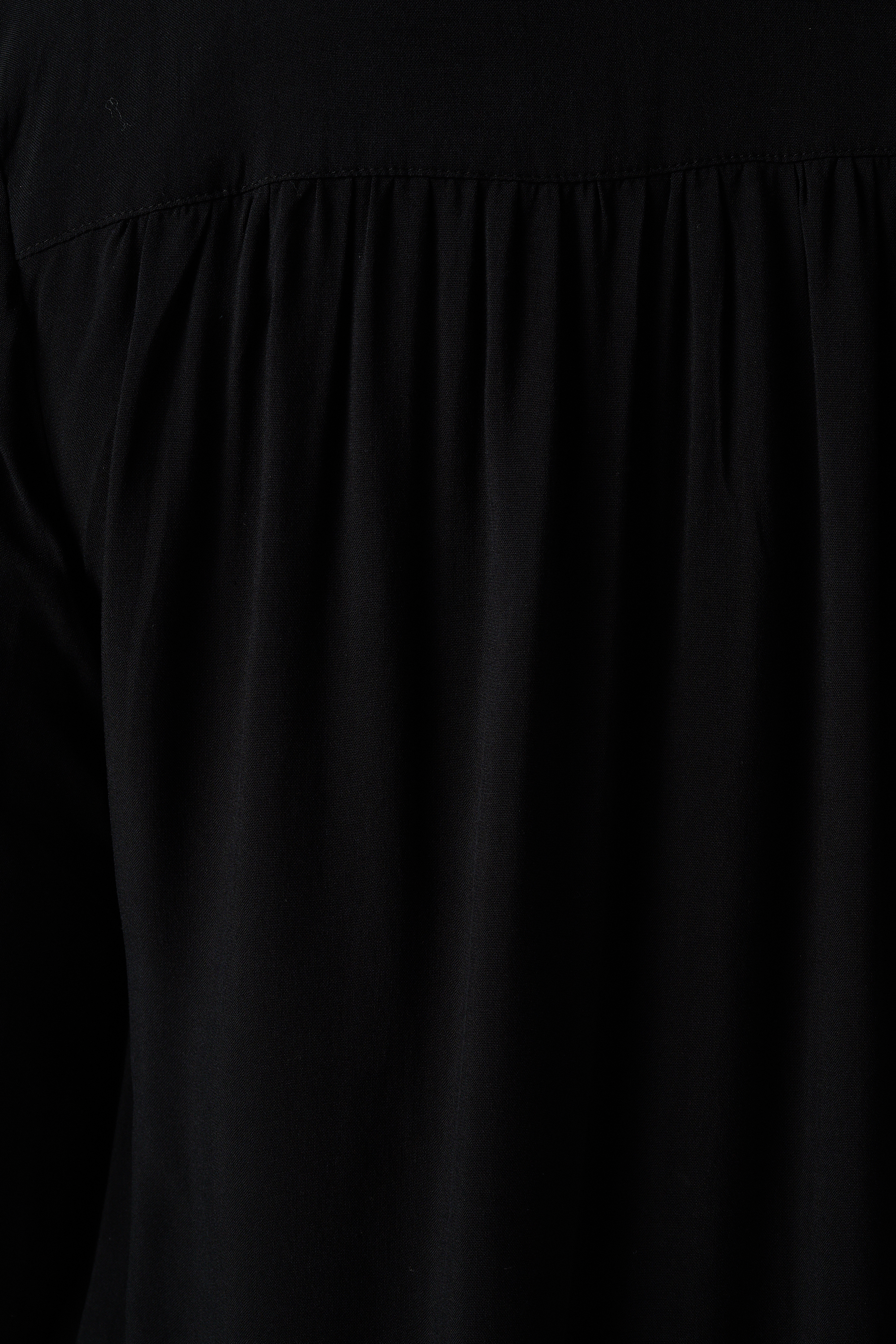 Ruimvallende blouse met v-hals Zwart