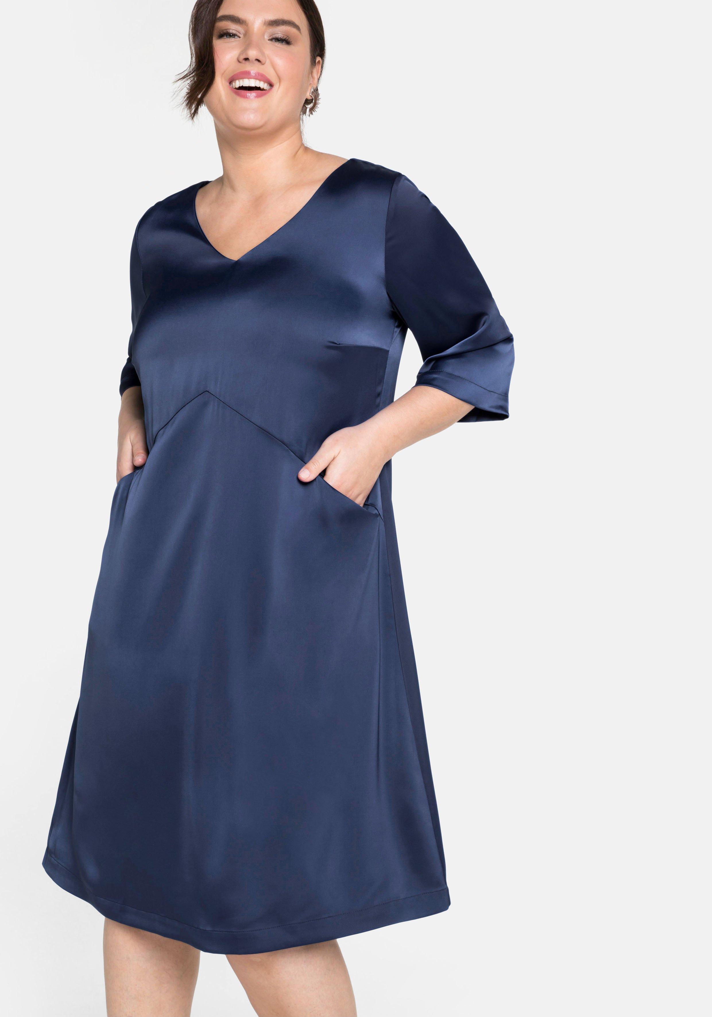 Cocktailkleid mit 3/4-Arm, in weiter A-Linie