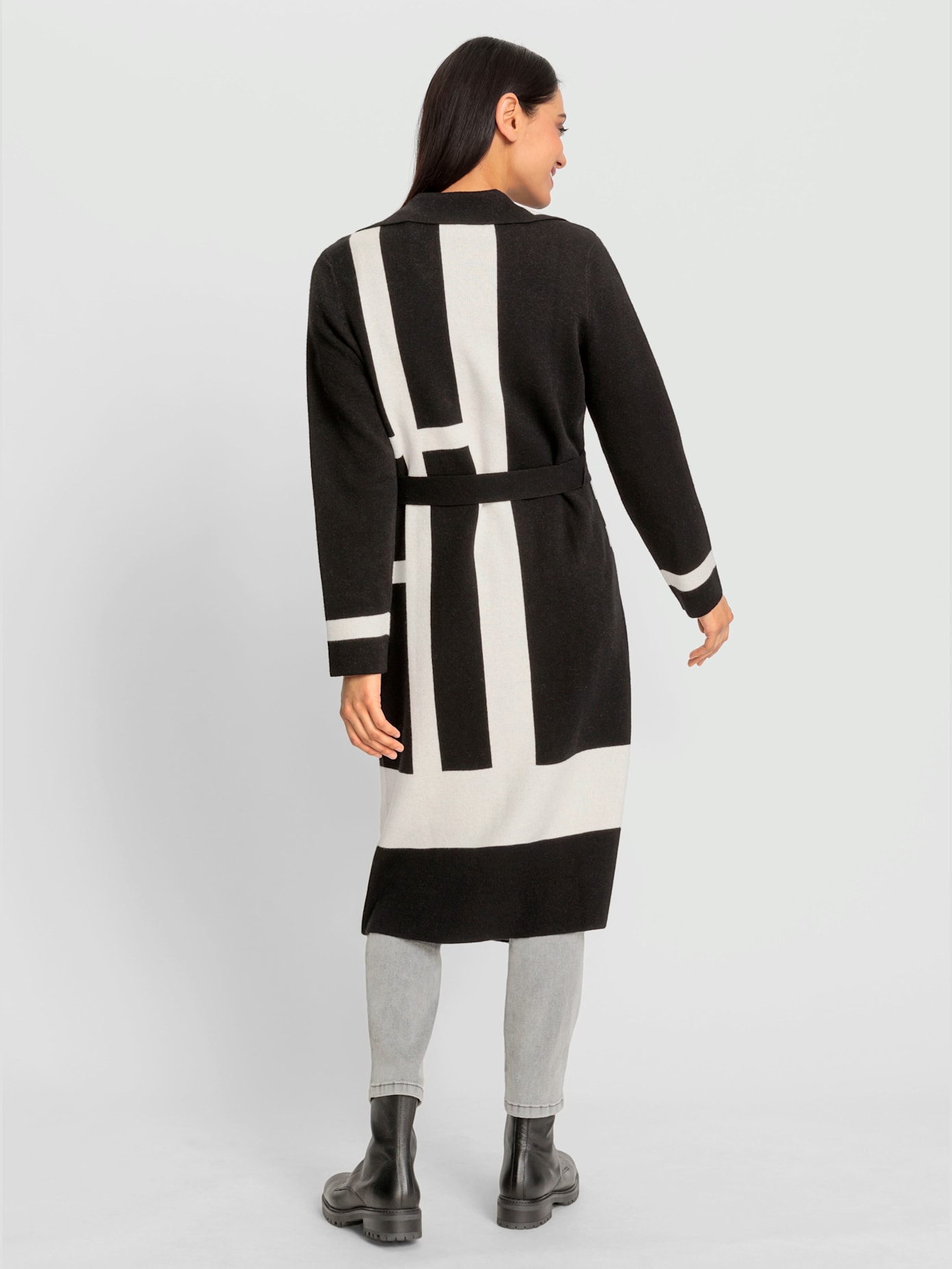 Manteau en tricot superbe et tendance