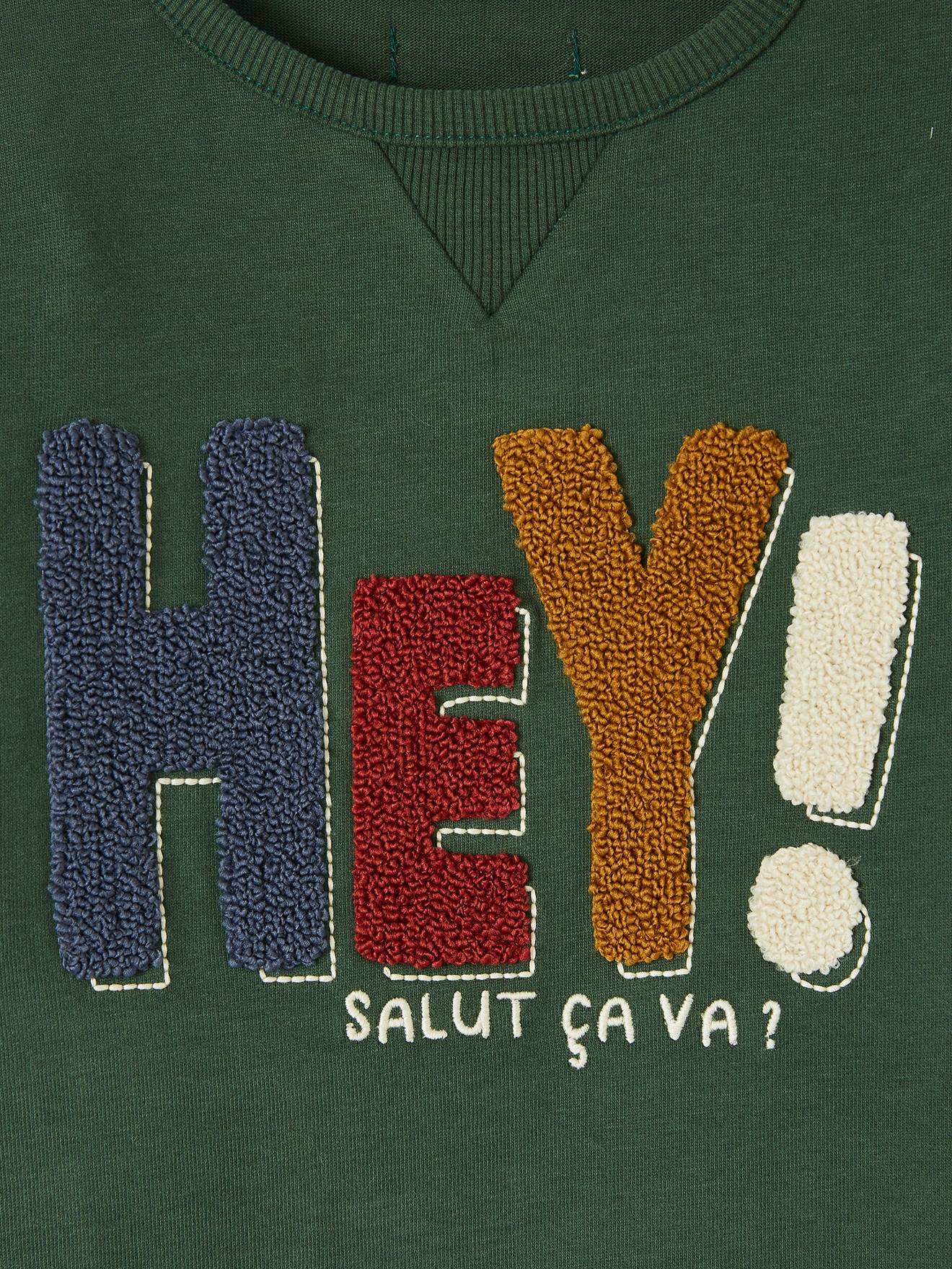 Camiseta com mensagem, tecido atoalhado, verde-escuro liso, estampa infantil.