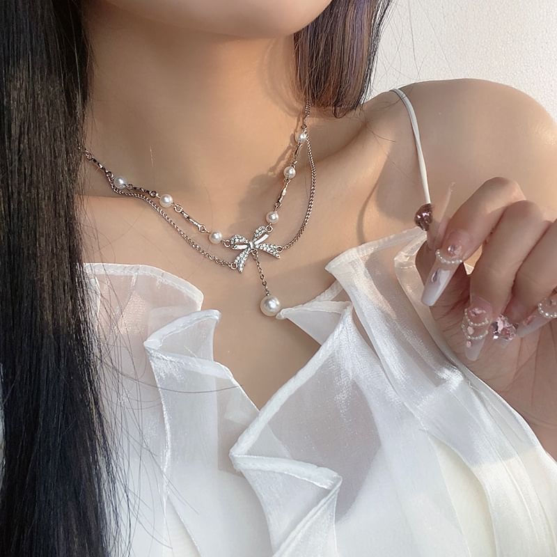 Milkieway - Nepparelketting met strass-strik