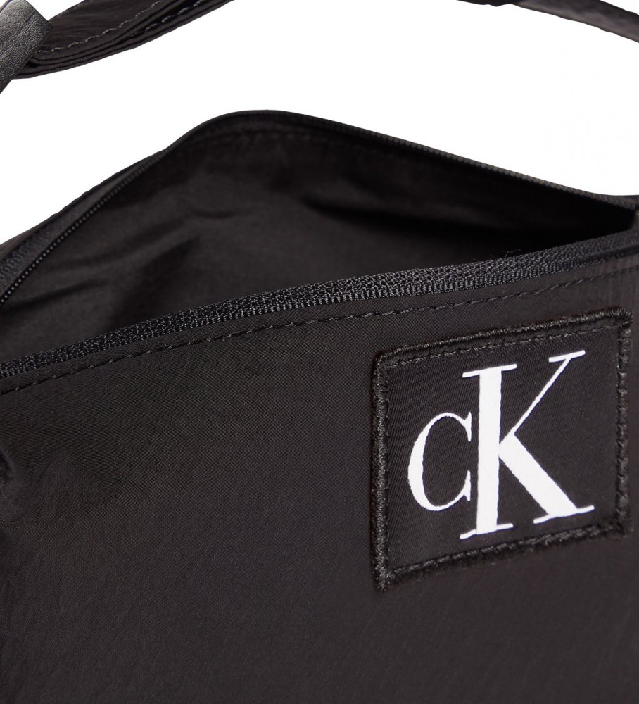 Nécessaire de maquiagem Calvin Klein Jeans City em nylon, preta.
