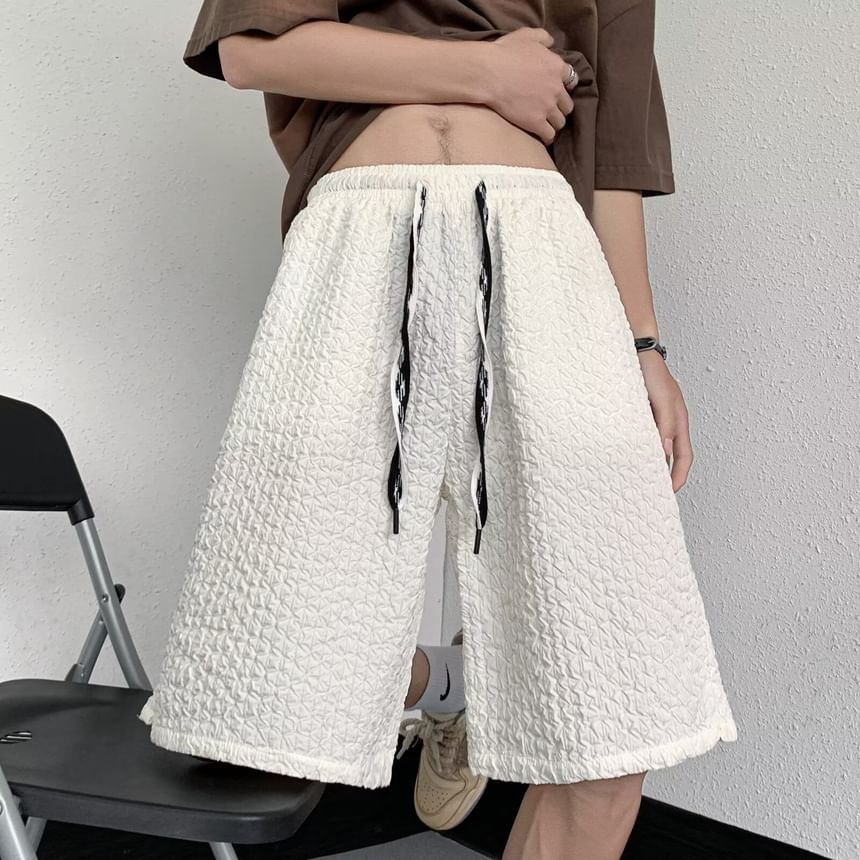 Maxelane - Effen shorts met trekkoord en split