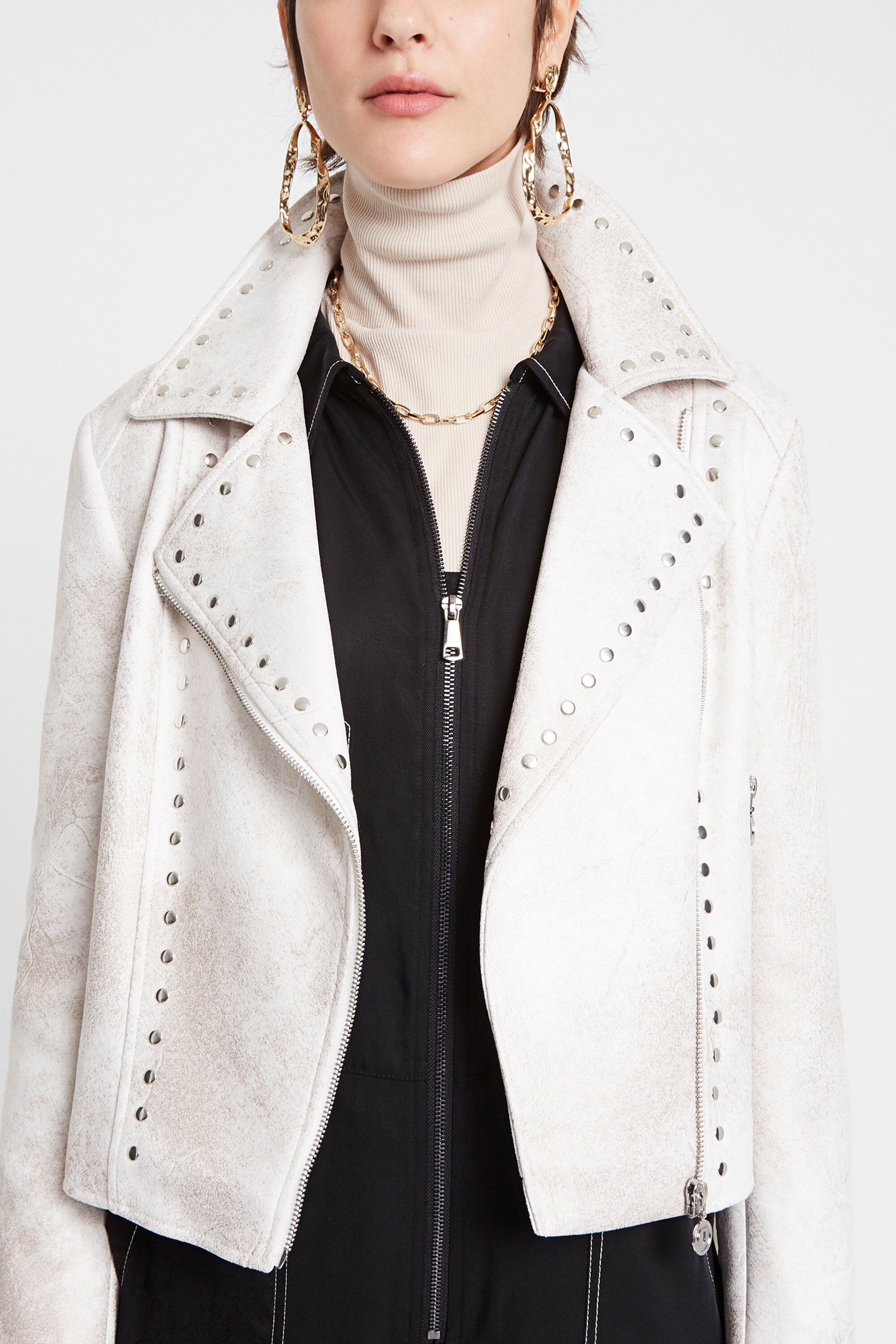 Veste motarde à franges et clous