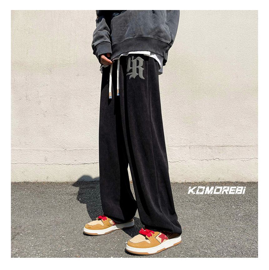 FOEV - Joggingbroek met trekkoord en letters
