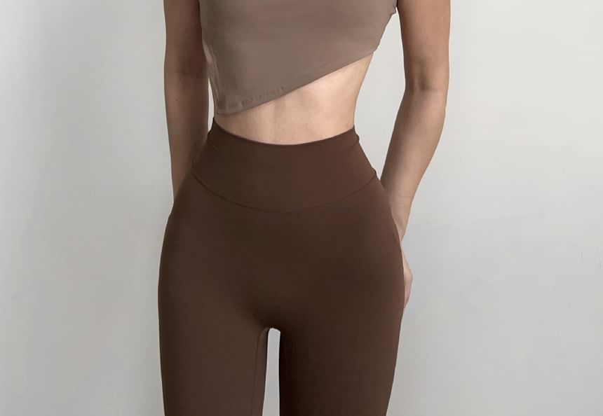 Arigne - Effen asymmetrische sportbeha-top met één schouder