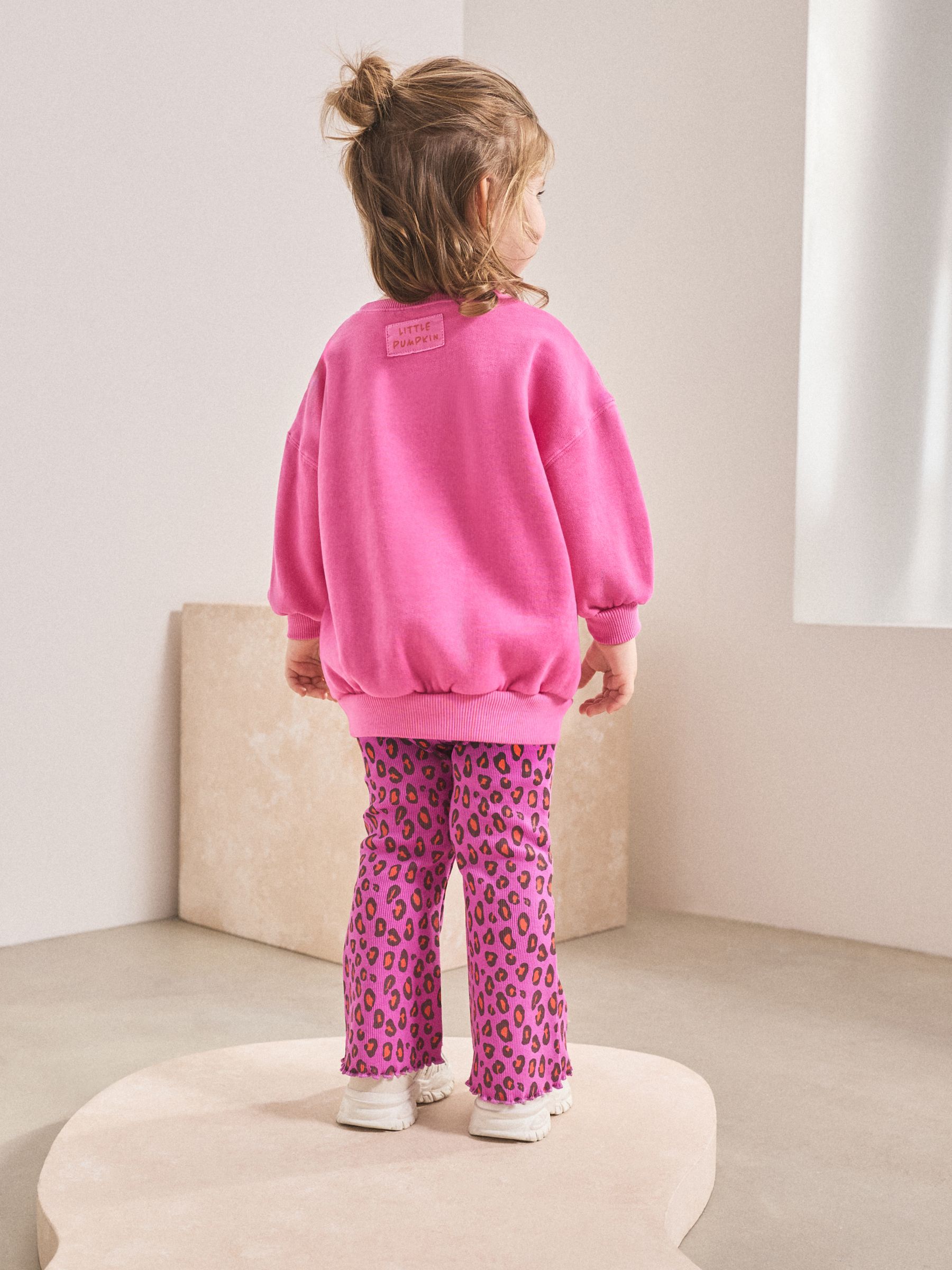 Roze dierenprint met hartjes - Set van sweatshirt en uitlopende legging (3mnd -7jr)