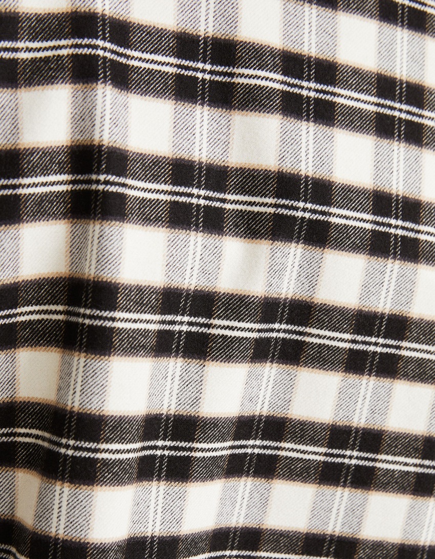Camisa xadrez cropped de manga comprida com zíper.