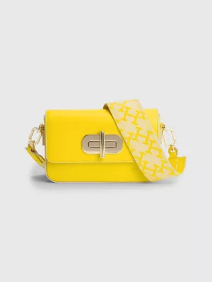 Bolsa com alça de couro e monograma com fecho giratório