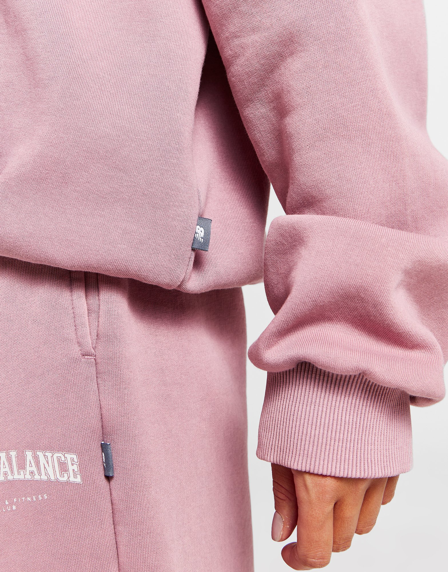 New Balance Sweat à Capuche Logo Délavé Femme