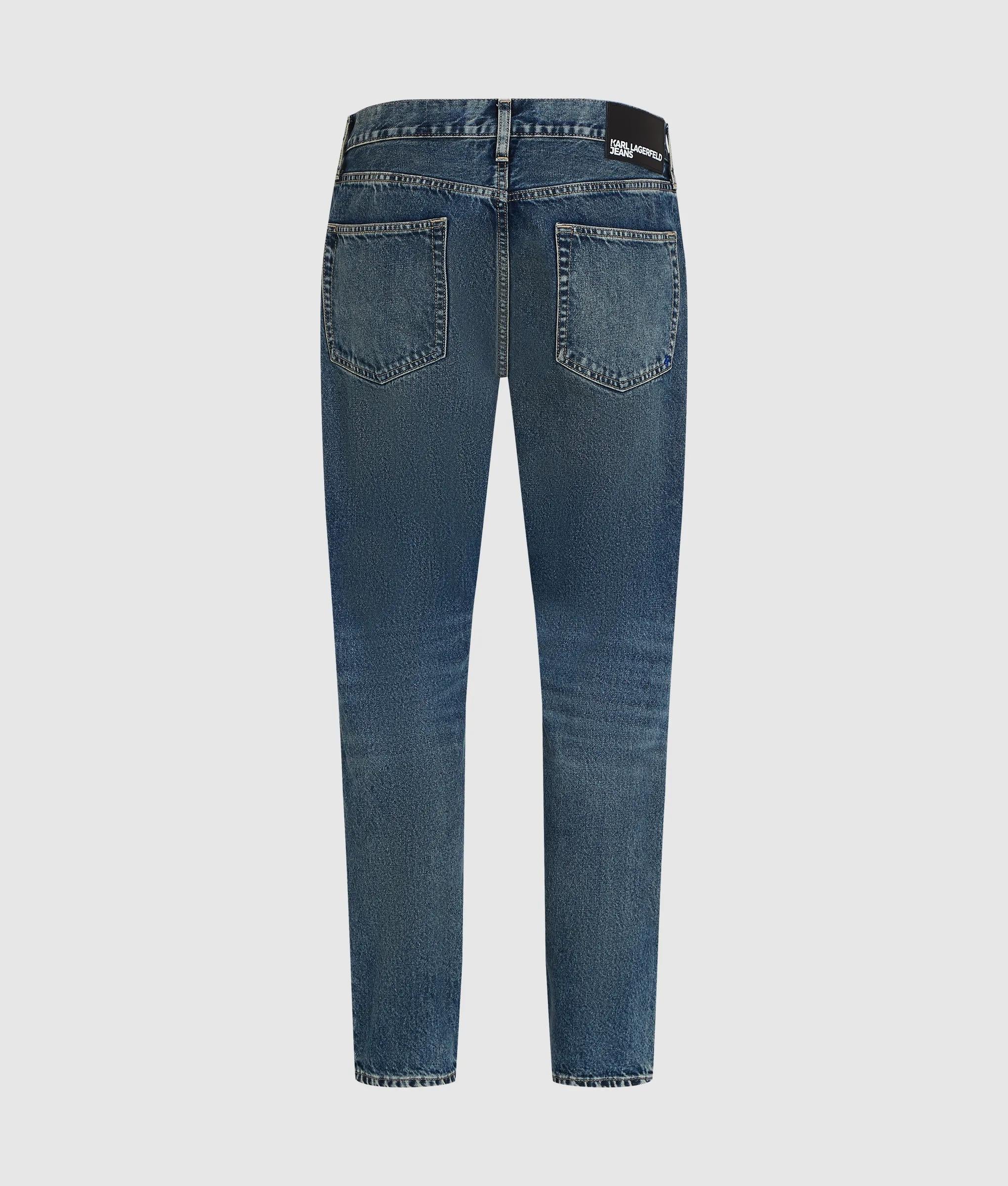 Donkerblauwe smal toelopende jeans