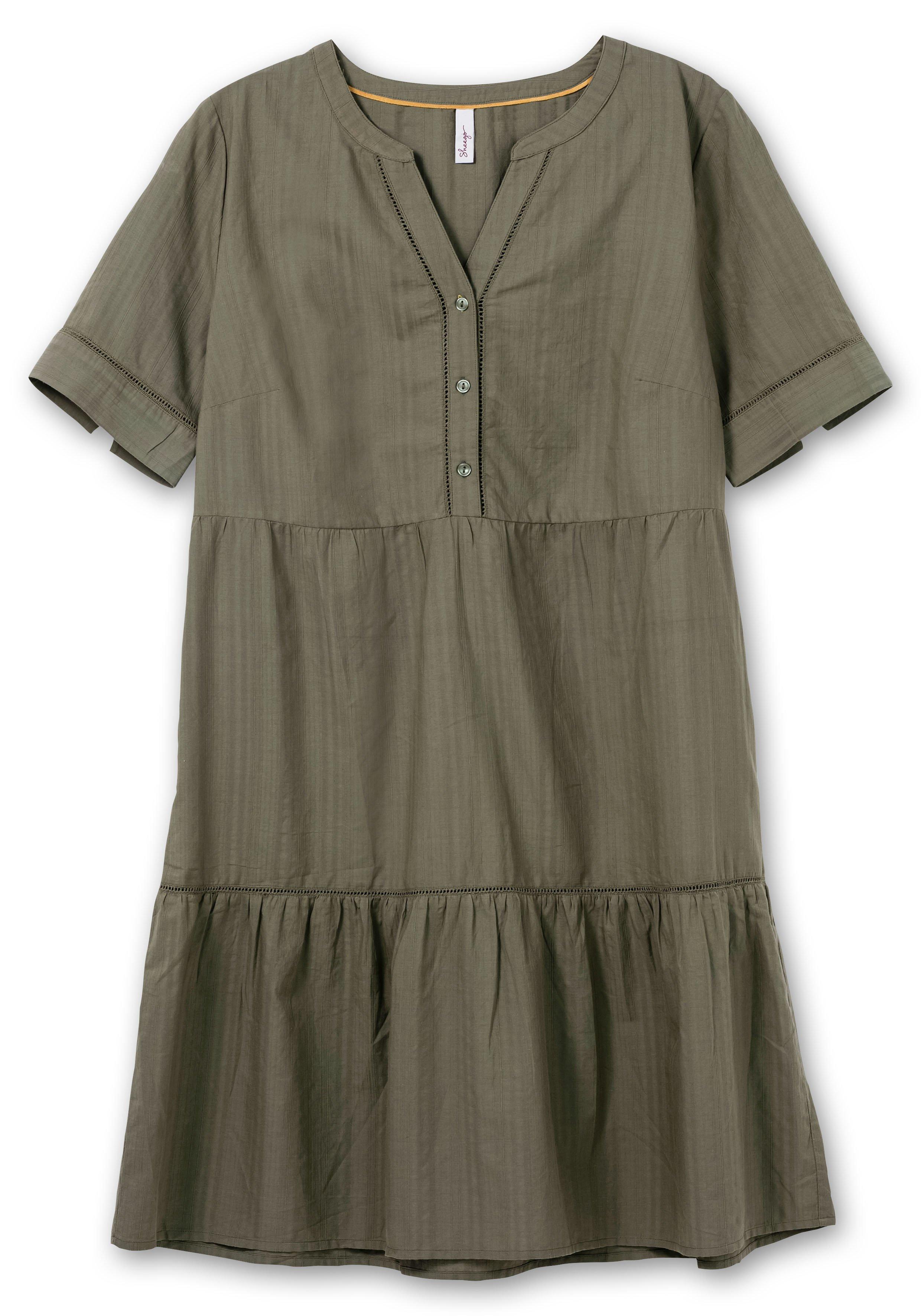 Kleid in Stufenoptik mit Lochmusterdetails