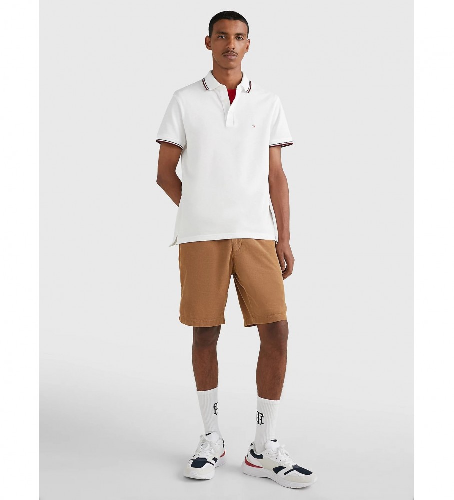 Camisa polo Tommy Hilfiger com acabamento canelado, coleção 1985, branca.