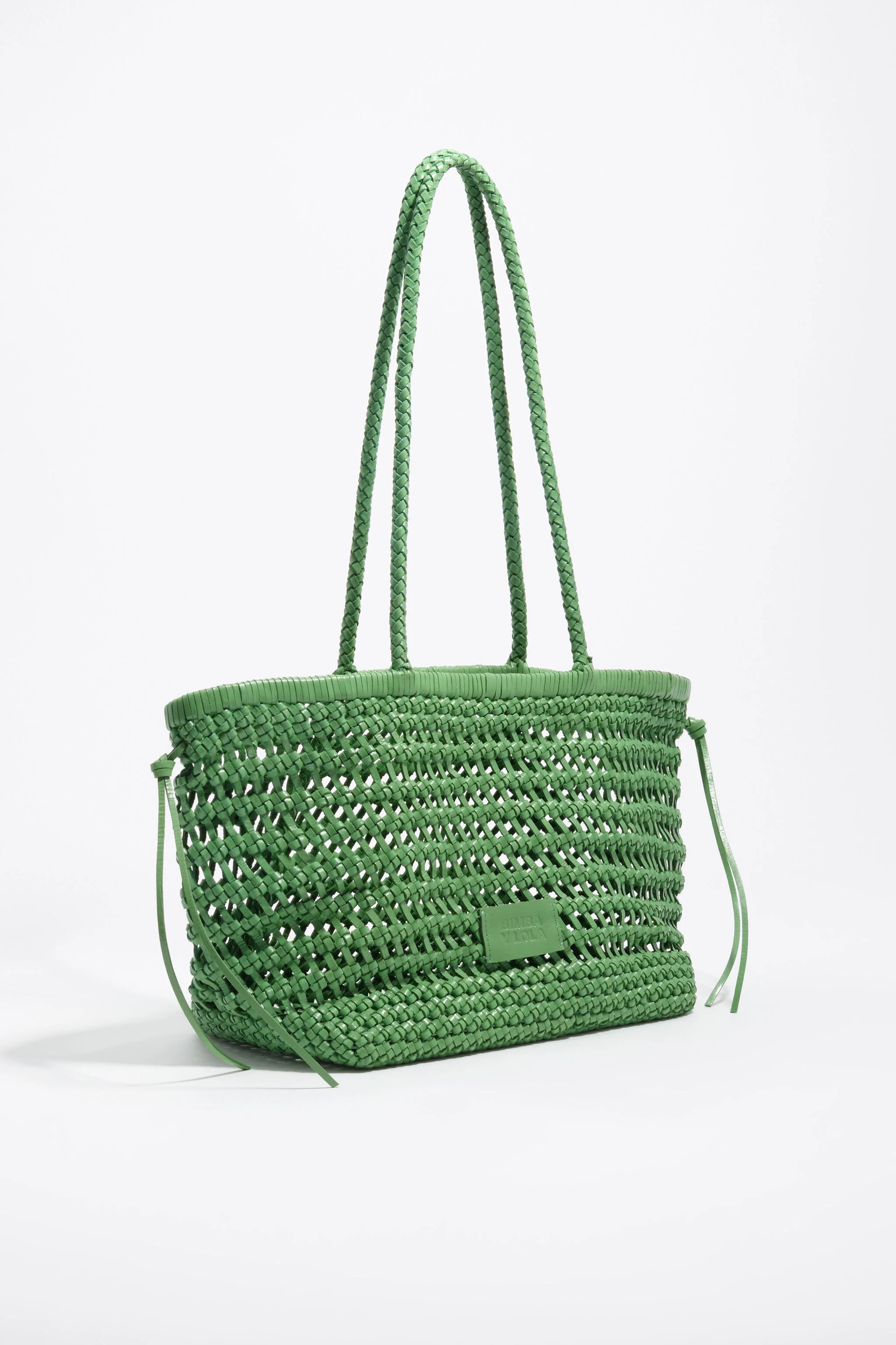 Bolsa de compras grande em couro trançado verde-esmeralda