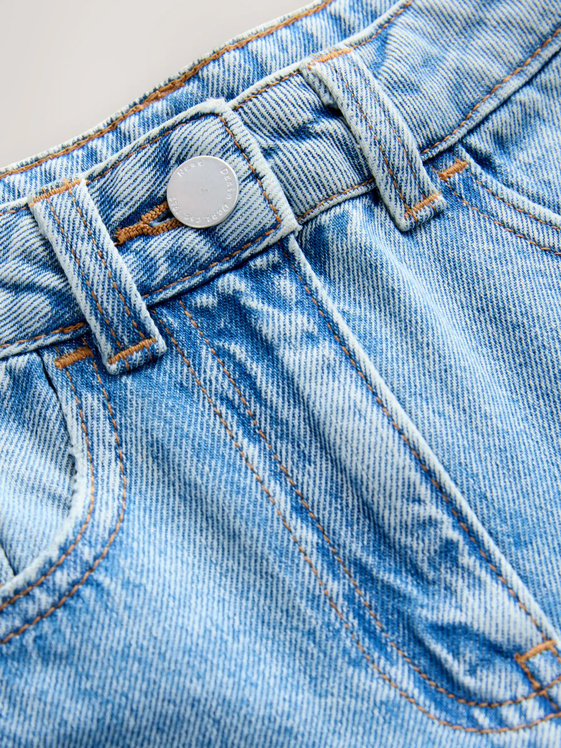 Lichtblauwe denim - Flare jeans met bloemenversiering (3-16jaar)