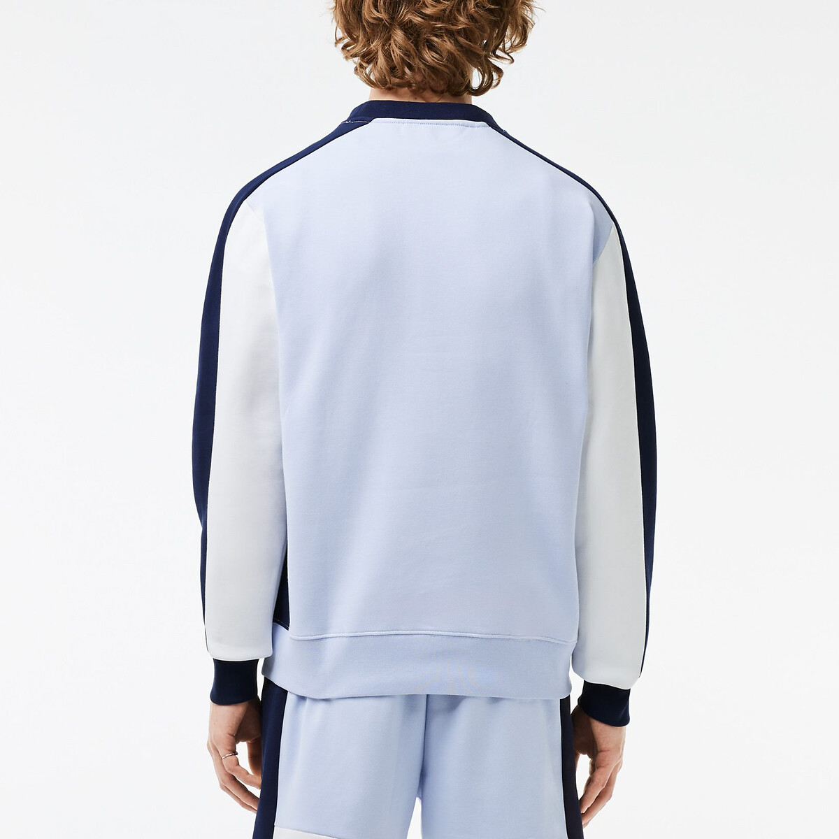 Suéter LACOSTE com gola redonda e blocos de cor, em fleece.