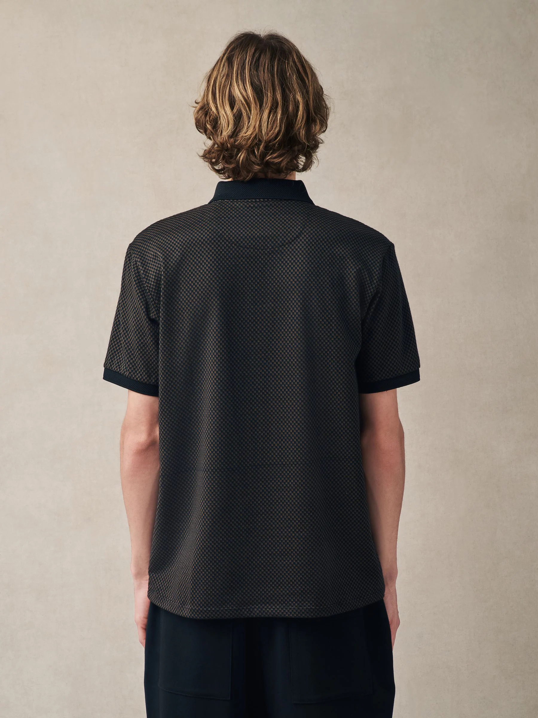 Zwart met goud - Modieus poloshirt met kwartrits