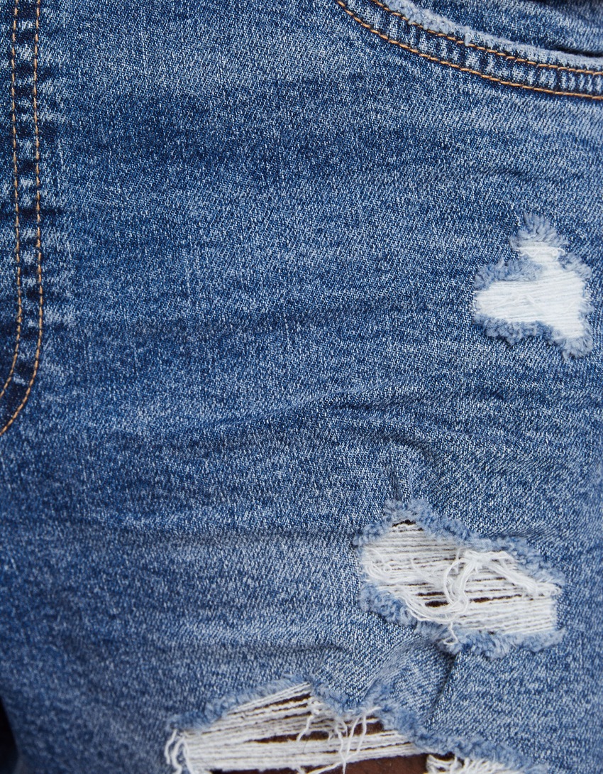 Bermuda jeans rasgada