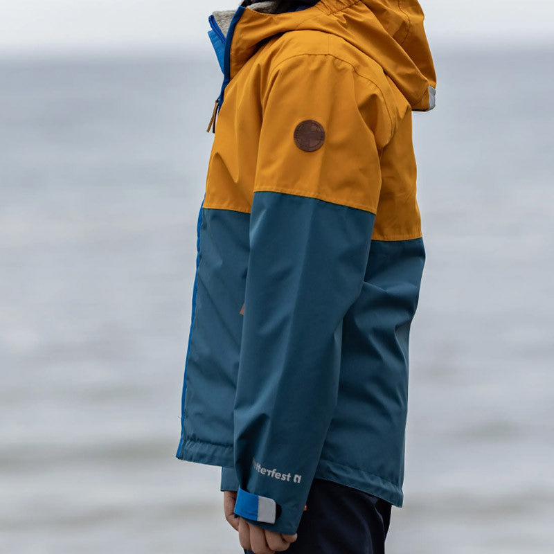 Kinder Puck Regenjacke inca gold