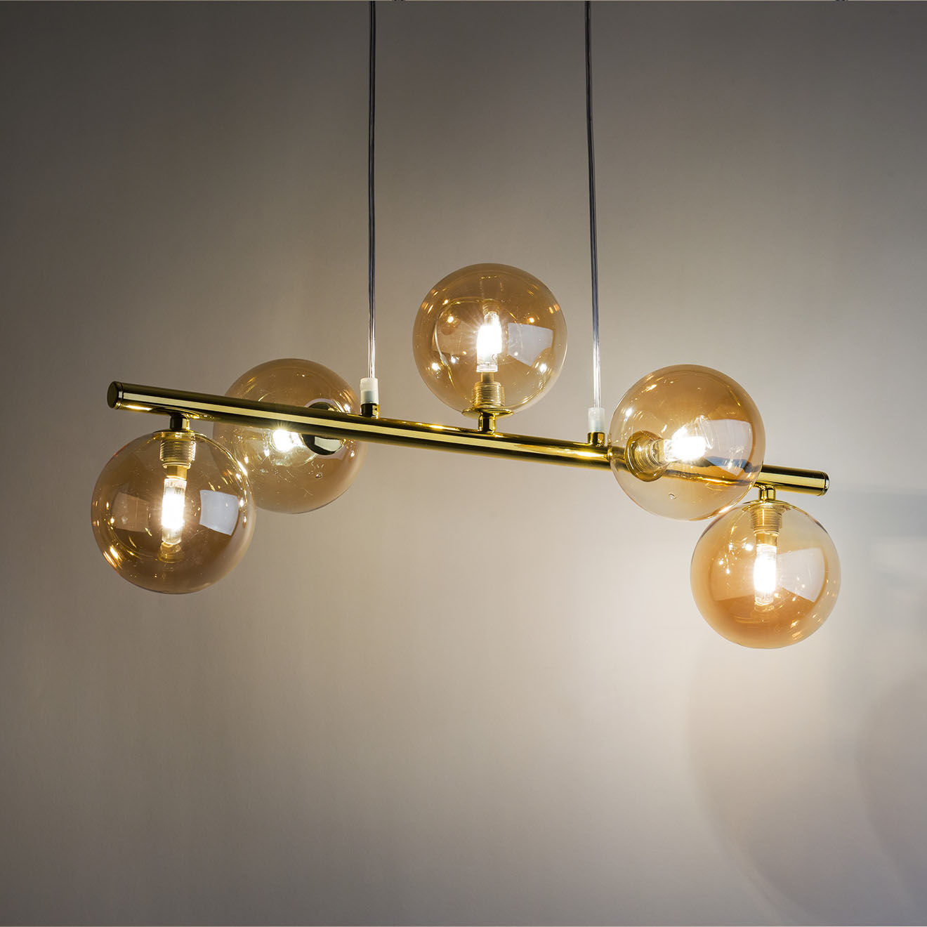 Micadoni Suspension Alioth doré/ambre - 27x63x115 cm