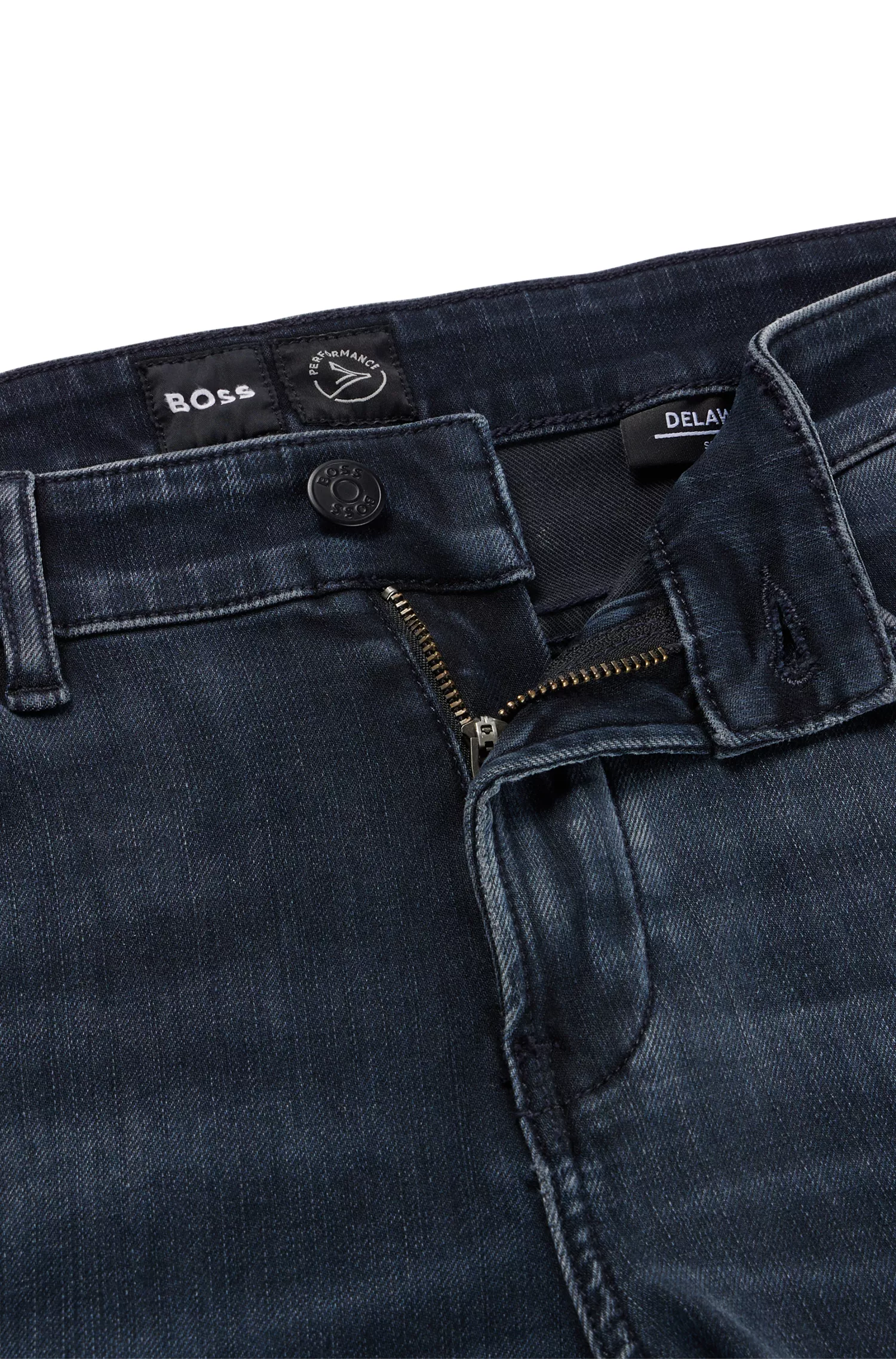 Calça jeans BOSS preta, corte slim, em denim de malha azul.