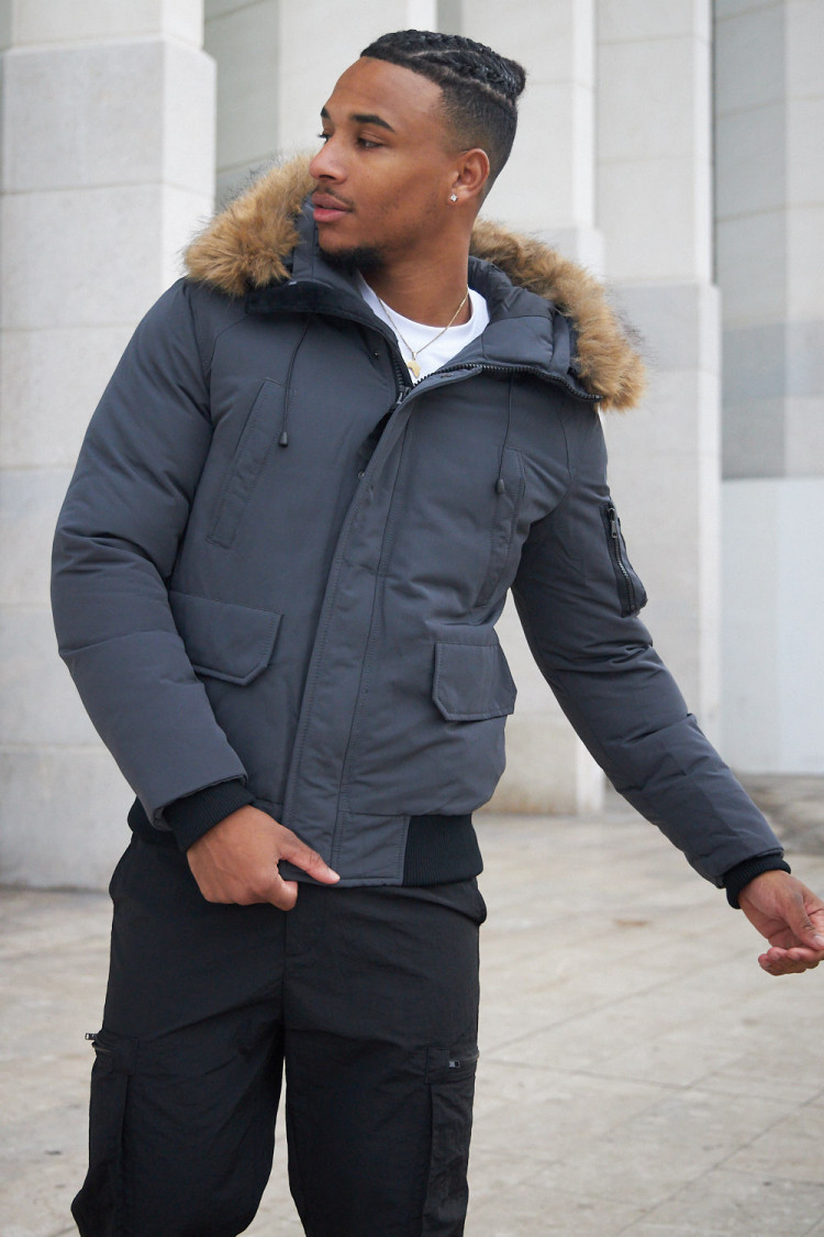 Parka bi-matière grise à capuche en fourrure
