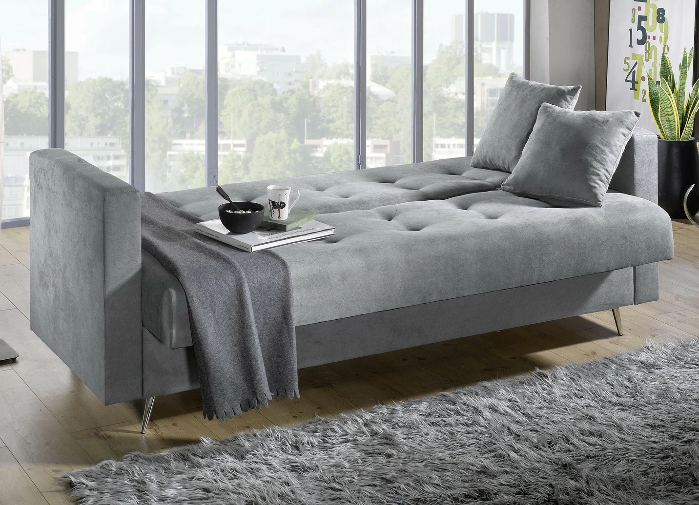 Schlafsofa auf Chromfüßen mit Bettkasten