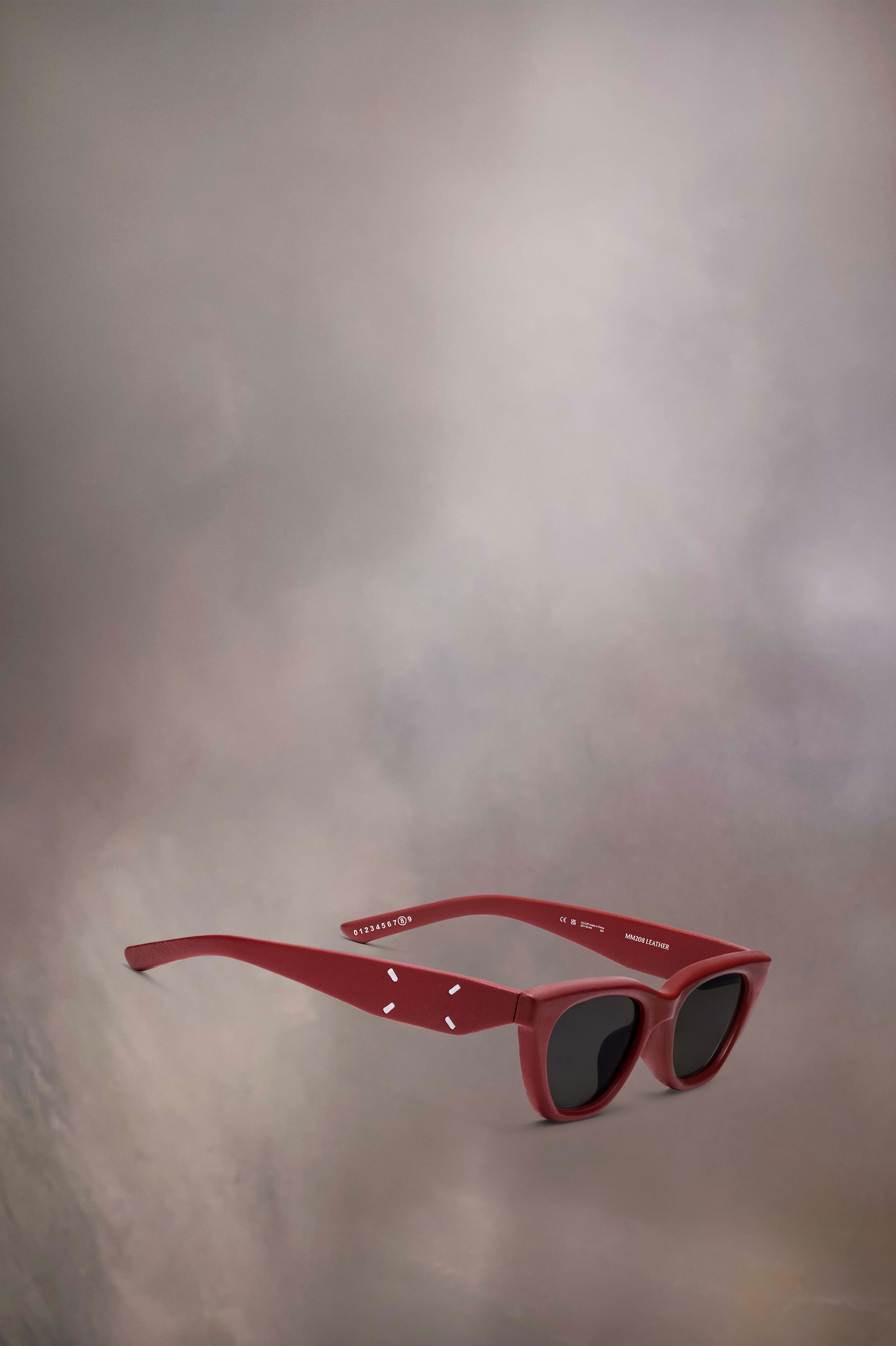 Lunettes de soleil en cuir rouges x Gentle Monster​