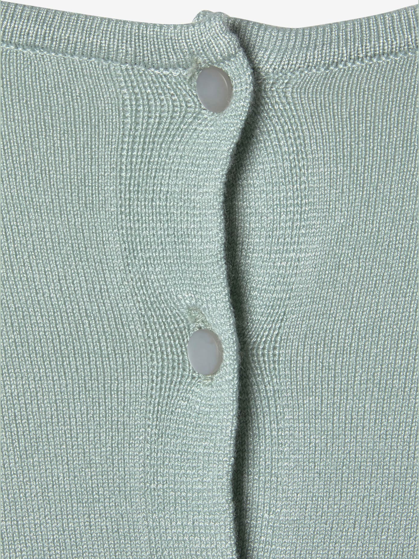 Pull à manches courtes patte de boutonnage au dos