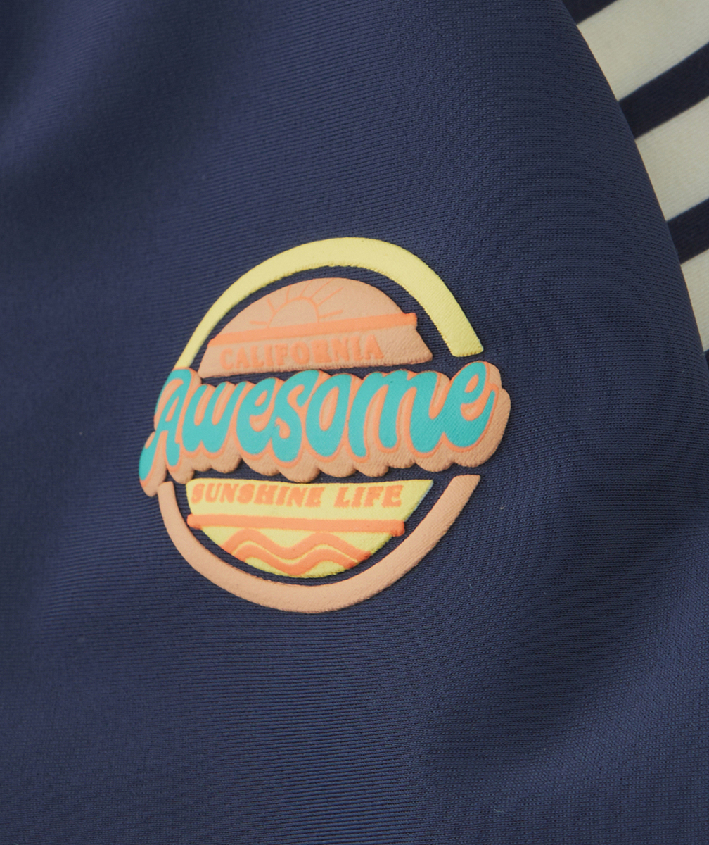 T-SHIRT DE BAIN GARÇON ANTI-UV EN FIBRES RECYCLÉES DEMI-ZIPPÉ
