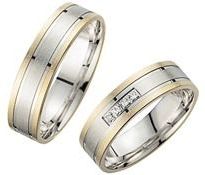 Trouwringen geel en witgoud met Diamanten breedte 5,5 mm