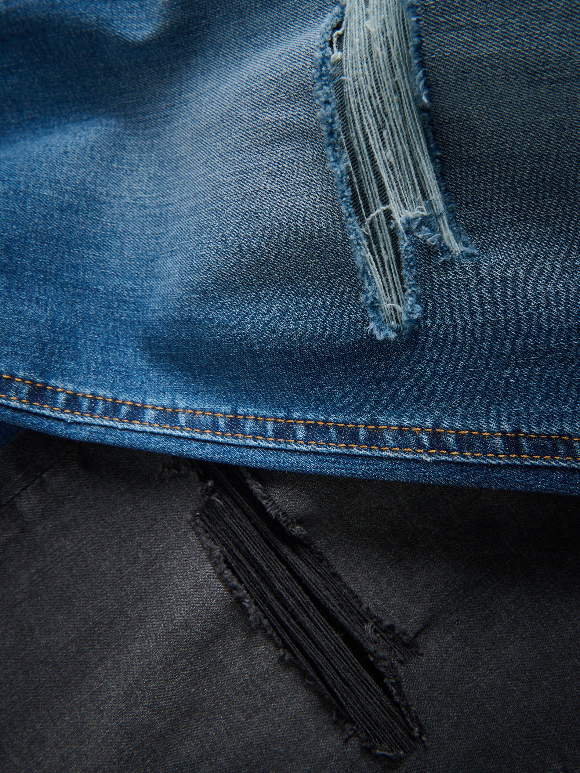 Skinny Jeans mit Used-Effekten