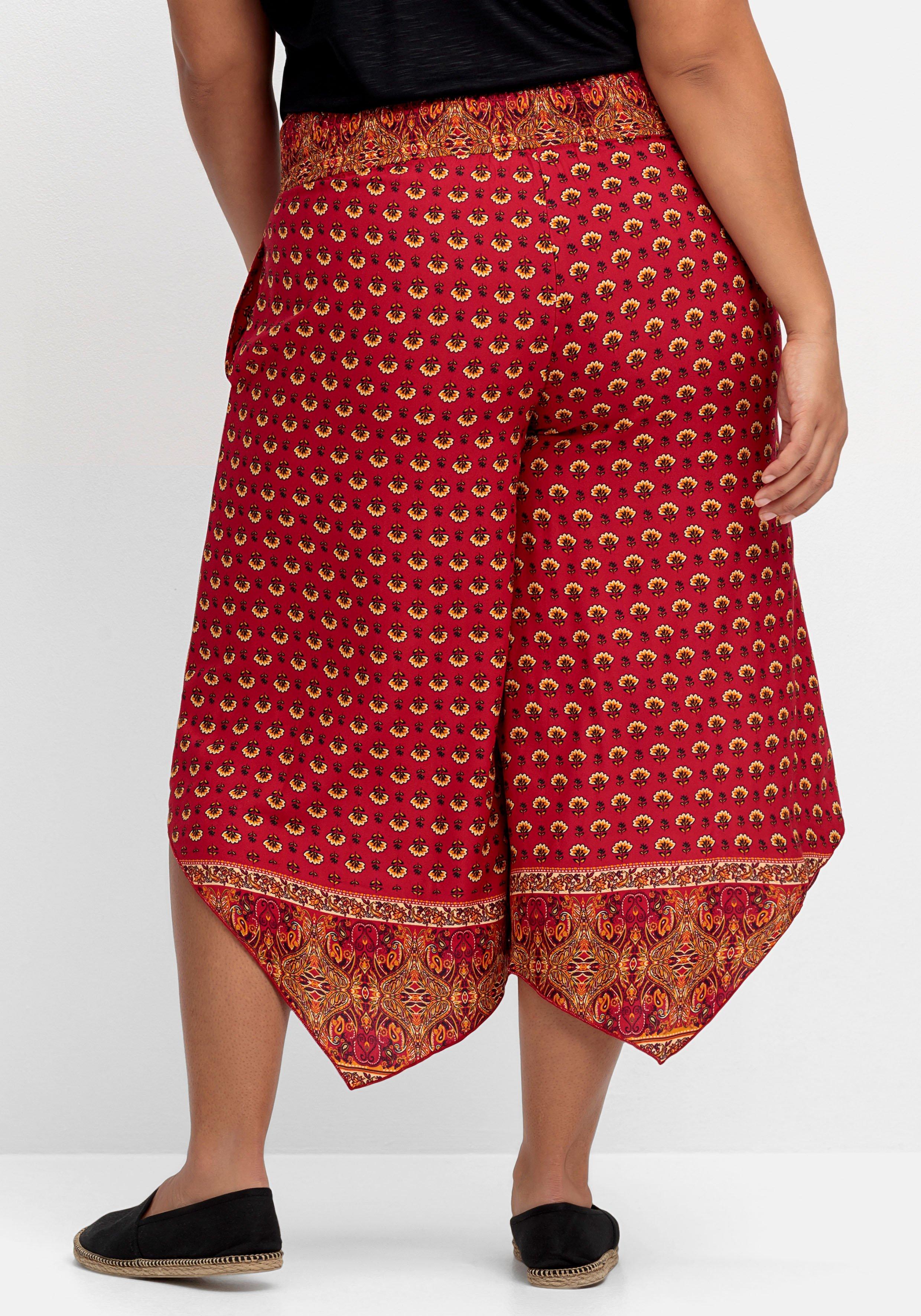 Gemusterte Hose mit Smokbund und Zipfelsaum