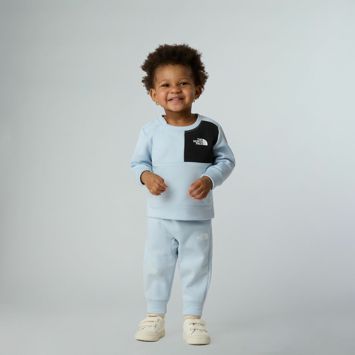 THE NORTH FACE<br>Treino com suéter e calça de fleece