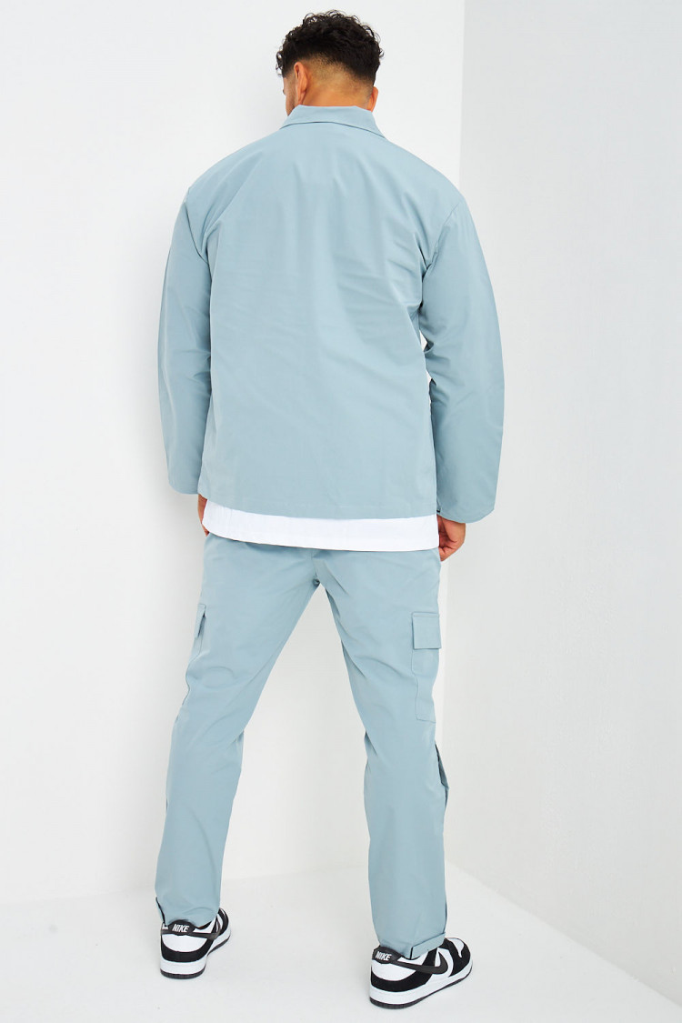 Ensemble de jogging veste + pantalon bleu grisé à boutons