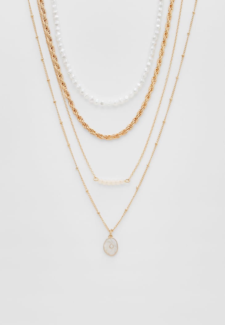 Conjunto de 4 colares com pedras e pérolas artificiais.