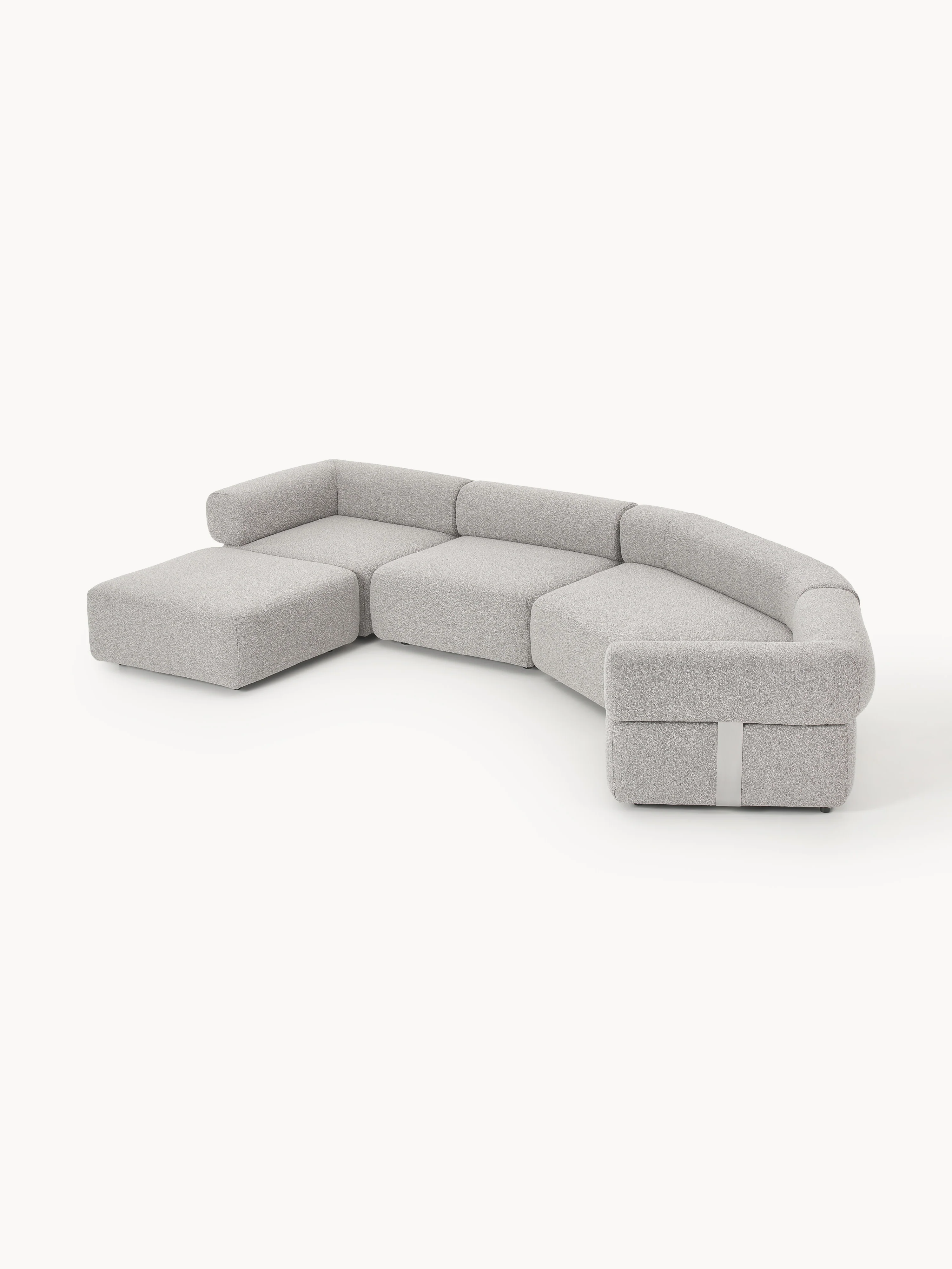 Grote modulaire bank Anton van bouclé met poef (links/rechts)